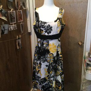 Jolibel yellow black and white Dress has a buckle in the front measures 19 p2p